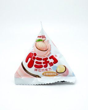 Шоколадные шарики Meiji choco baby chocolate peach 10г 2590 фото